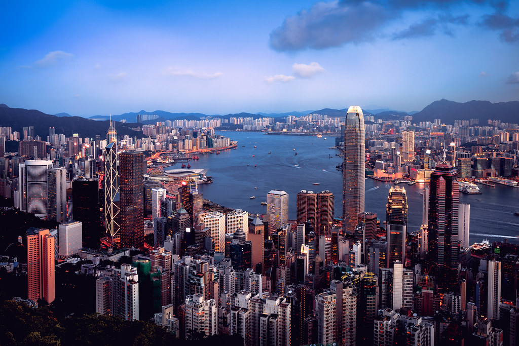 Hong Kong daytime skyline backdrop for the Salaries Tax founders guide